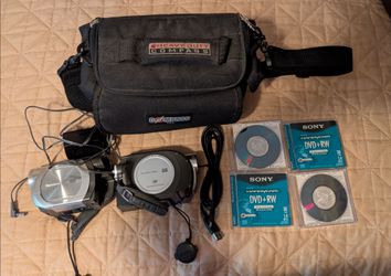 Two Panasonic Recorders. Bag. Discs. Charger