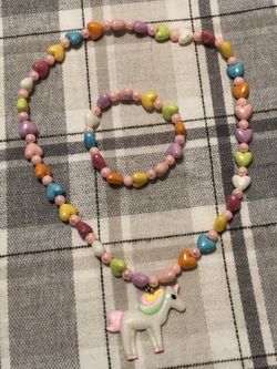Hand made necklace set with unicorn charm