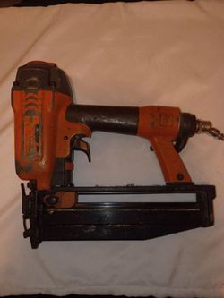 Rigid pneumatic finishing nail gun