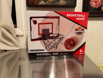 Basketball hoop with electronic scoreboard
