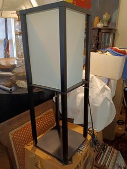 Two black square table lamps.