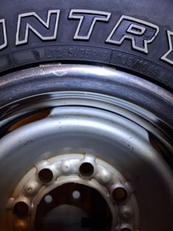 TOYO A/T OPEN COUNTRY LT245/75R16 Tire on Steel Wheel