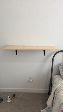Shelf with brackets