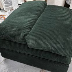 Part of the sofa with two pillows