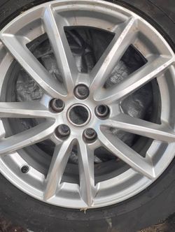 (1) Brand New 235 65R19 Tire with Wheel. 235/65/19