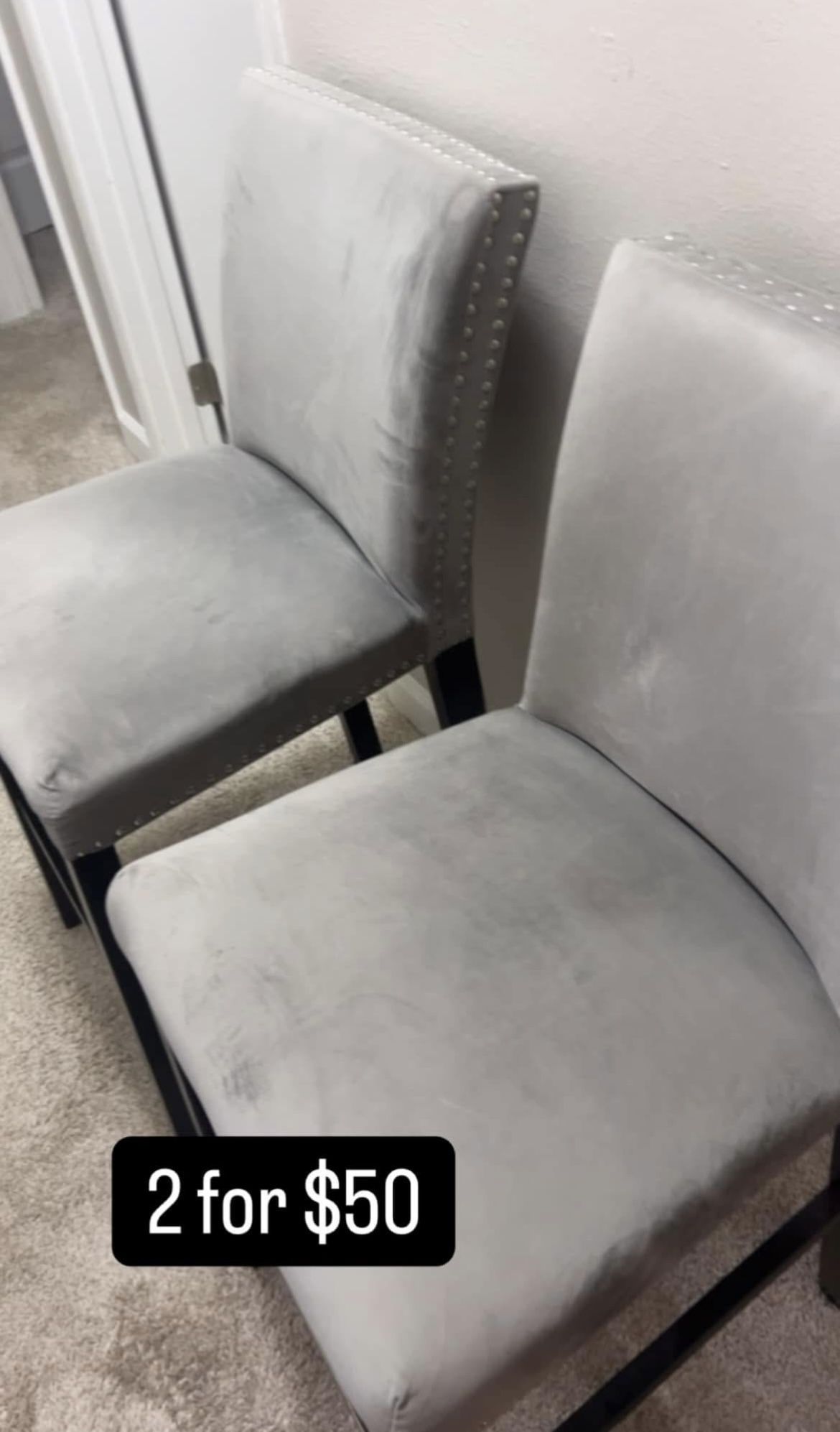 2 Island chairs, gray rhinestone, all in good condition asking 50$ if you take both