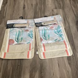 2 shower current sets with bath rugs Each $20