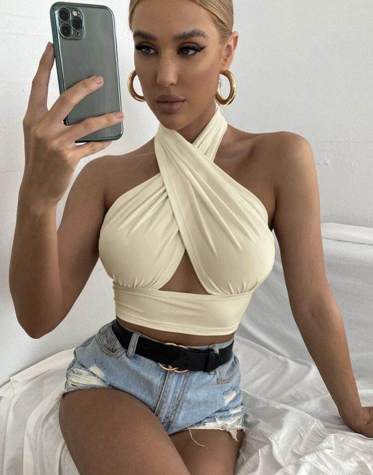 Solid cross crop halter top (cream color)