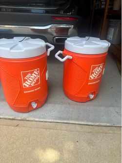 two Rubbermaid 5-gallon insulated water coolers in good used condition.