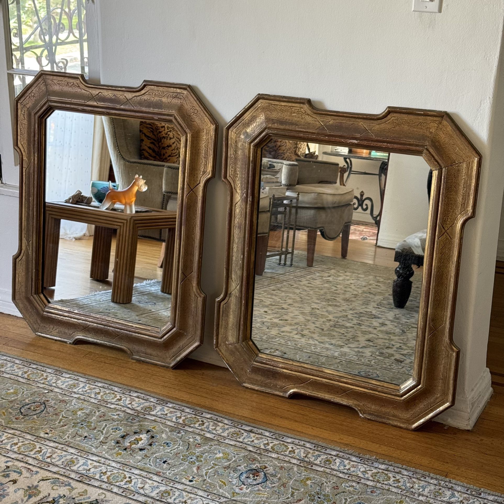 Antique Napoleonic Neoclassical Wall Mirrors in Gilt Wood, a Pair