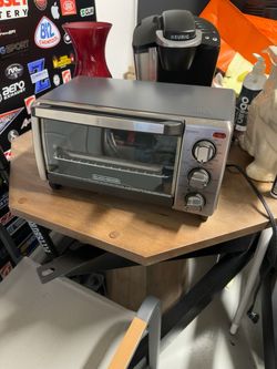 BLACK+DECKER 4-Slice Stainless Steel Toaster Oven with Even Toast Technology and 30-Minute Timer
