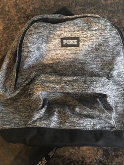 Pink backpack.