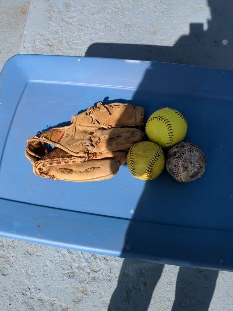 Baseball Glove And 3 Softballs