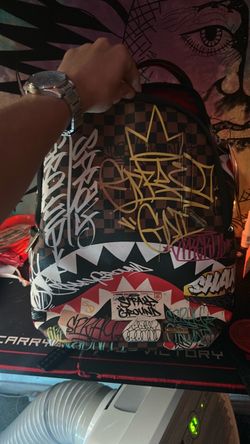 Spray ground backpack