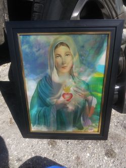 The picture of Mary it changes different pictures three of them
