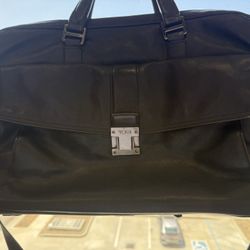 Used Tumi Bag leather