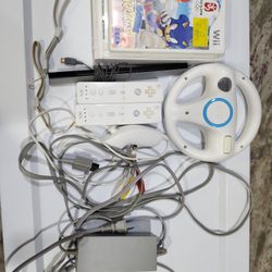 Nintendo Wii White RVL-001 – Bundle with Mario & Sonic Olympic Games + Wheel
Fully tested and working Nintendo Wii (RVL-001 backward compatible model)
