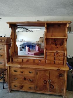 1980s hand carved color wood dresser with mirror.