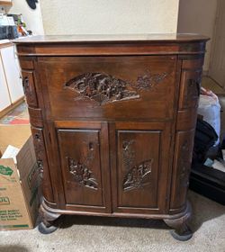 Vintage Chinese hand-carved folding dry bar or liquor cabinet