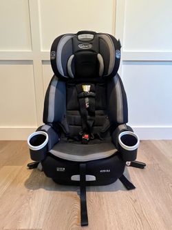 Graco 4Ever DLX 4-in-1 convertible car seat in black and gray
