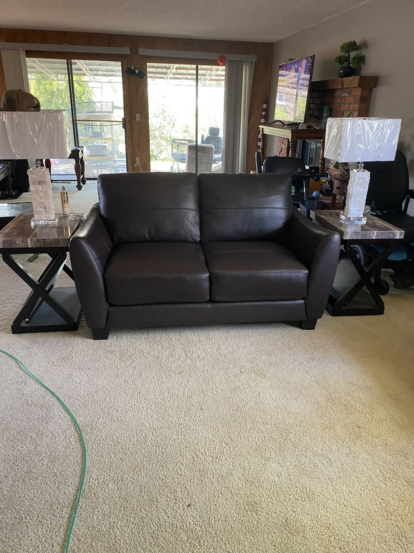 Sofa and loveseat, coffee table, and end tables