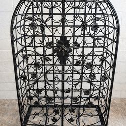 Spanish style black iron wine rack