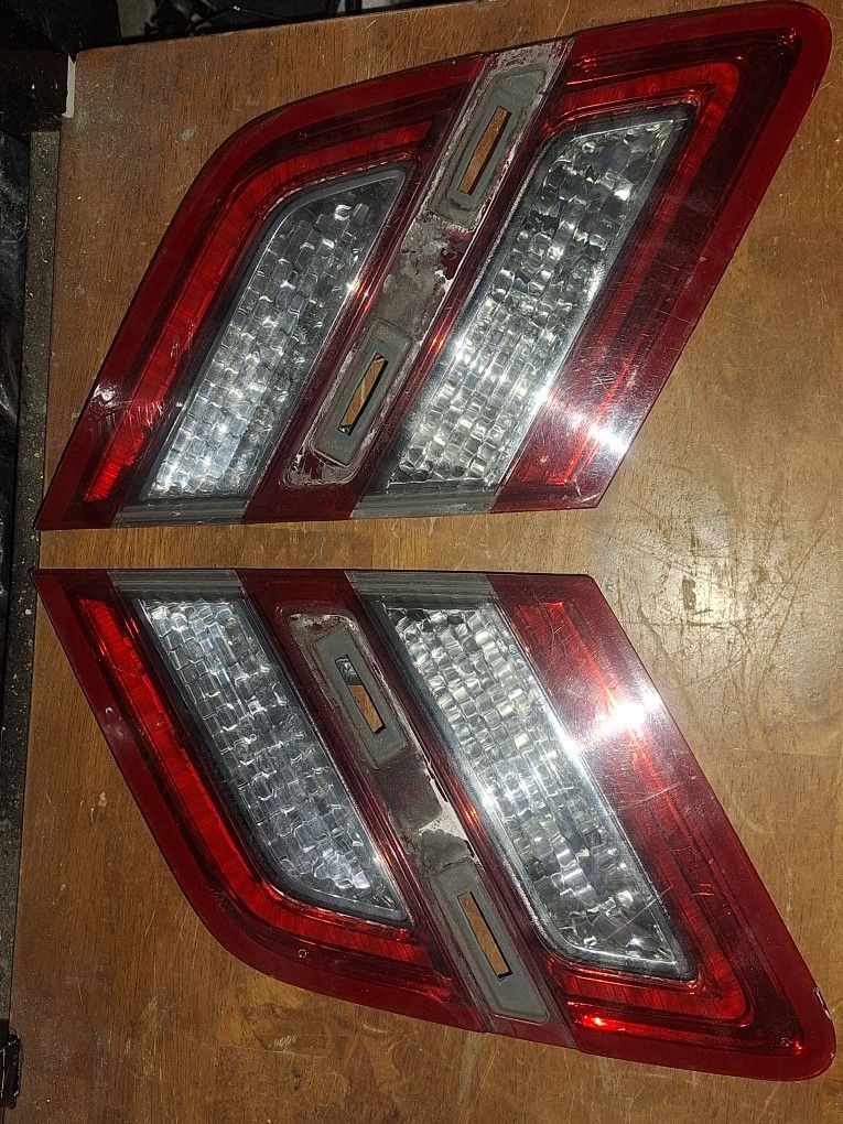 2013-2019 Ford Taurus Inner Trunk Tail Light right and Left  OEM in good condition.  