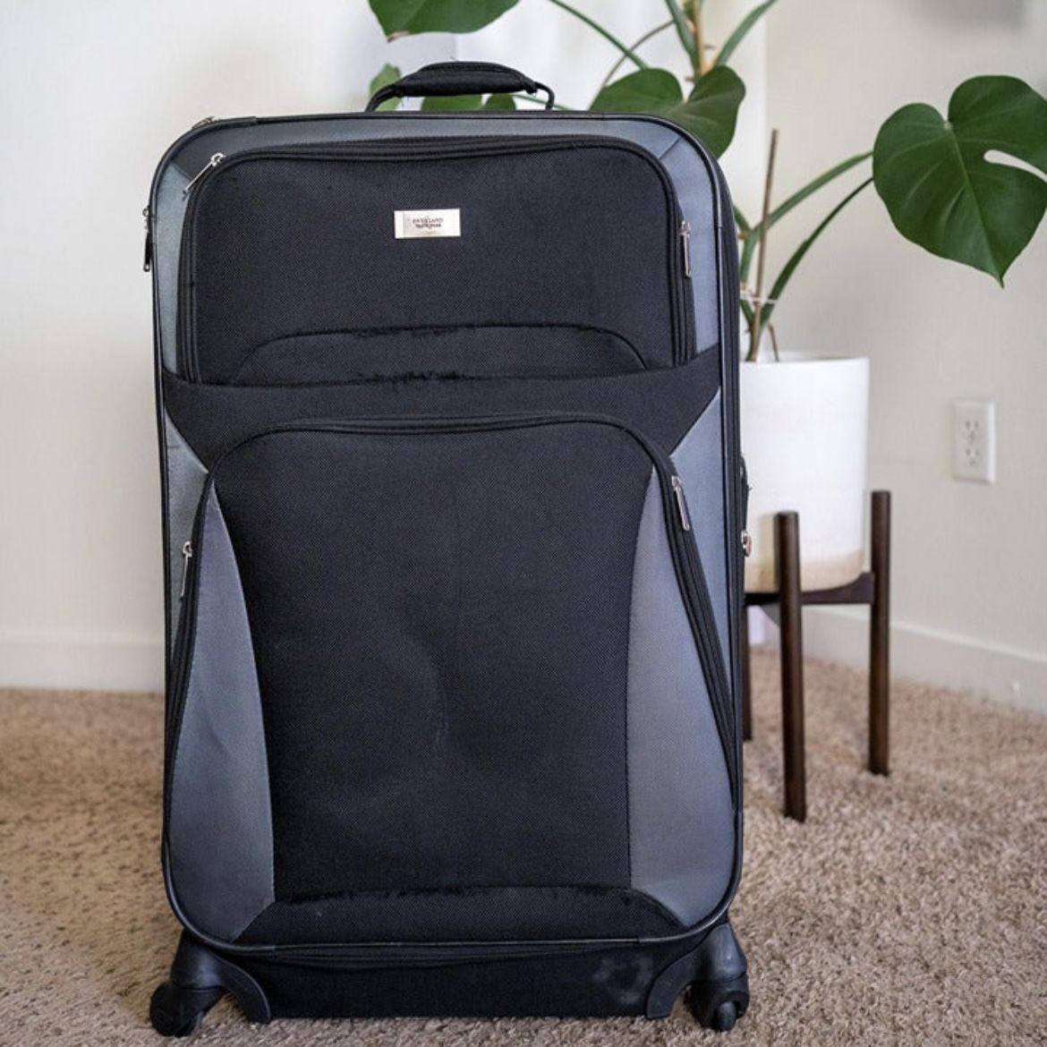 Overland Travelwear Large Expandable Luggage with wheels