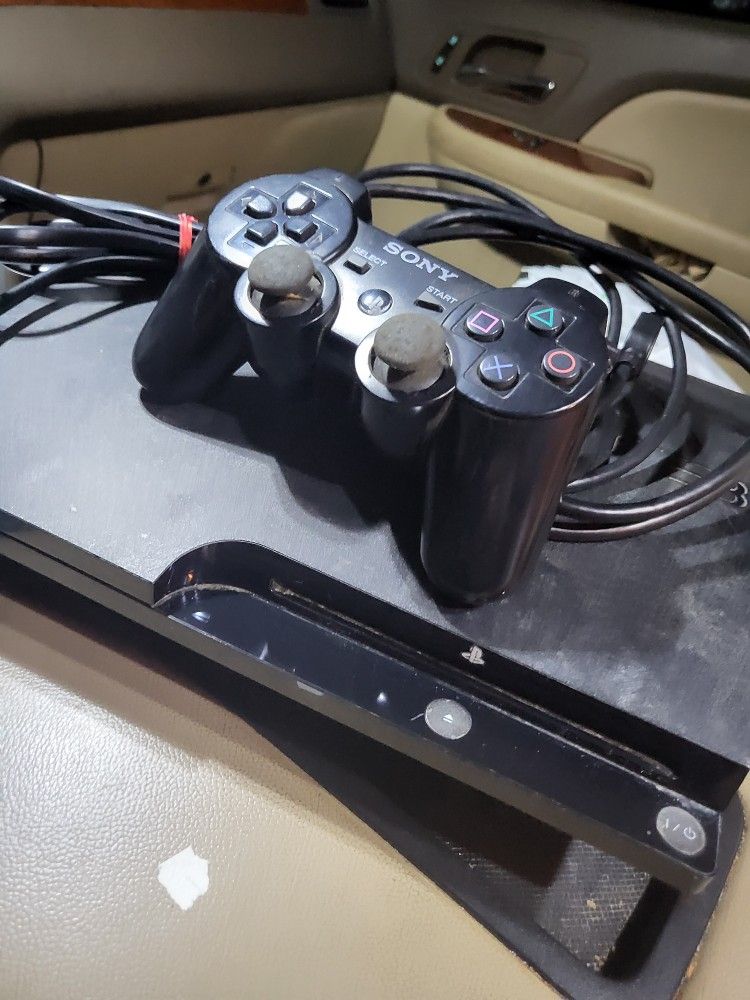 Playstation 3 System with controller and cords works perfectly in every way