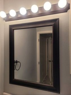 Bathroom bronze mirror and light set in good condition. - $40