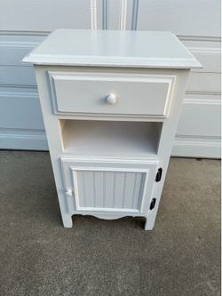 17.75” long x 13 3/8” wide x 29.5” tall White Wooden Nightstand