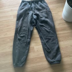 black essential fear of god sweats