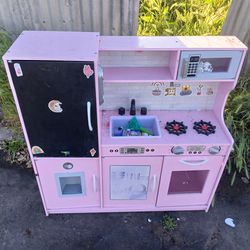 Little kids play kitchen