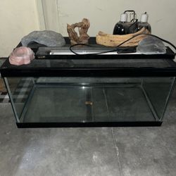 Tank (with items included such as water bowl, branch, two lights , cave)