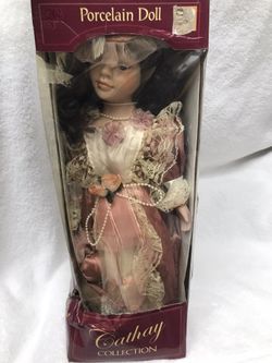 Vintage porcelain doll still in box never opened only $10