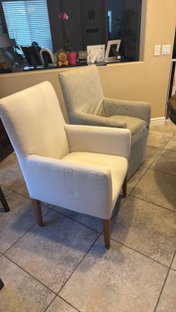 Two west elm chairs with arm rests
