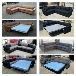 BRAND NEW 7X9FT  SECTIONAL WITH SLEEPER COUCHES. CHARCOAL, BLACK, CHARCOAL BLACK FABRIC AND  DAKOTA CAMEL LEATHER  Sofas Bed 2pcs 