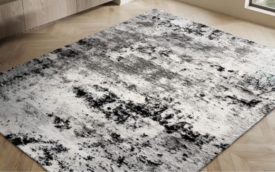 Huge area rug Ashley furniture
