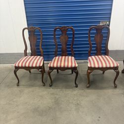 3 wood chairs