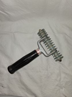 Carpet seam roller,