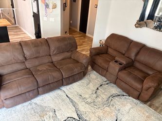 Two suede fabric reclining couches