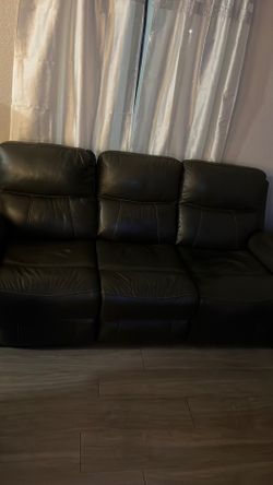 Brown leather recliner sofa