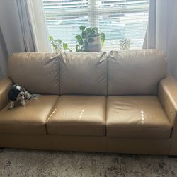 Camel color faux leather sofa