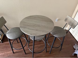 High top table with two chairs