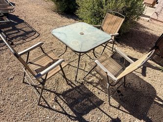 Glass Top Patio Table with 3 Folding Chairs