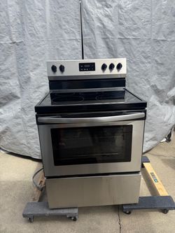 Frigidaire 5 burner electric range and oven - ver good condition