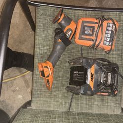 Brans New Ridgid Multi Tool With Jobsite Radio And Battery And Charger 