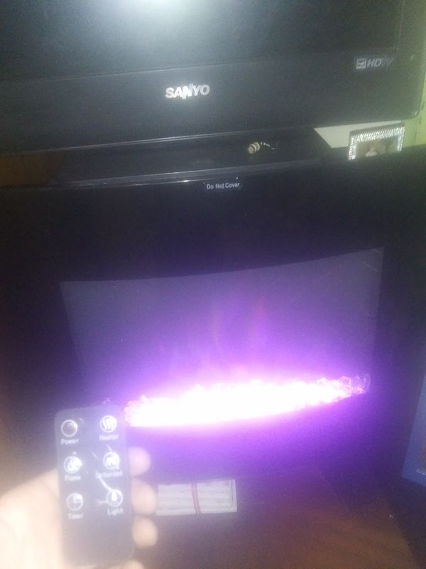 Electric heater \ fireplace colorful flame. Display for Sale in