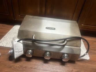 Barbecue, stand up burner and full tank of propane