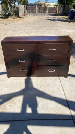 Homelegance Edina 6-drawer dresser in an espresso finish with silver hardware